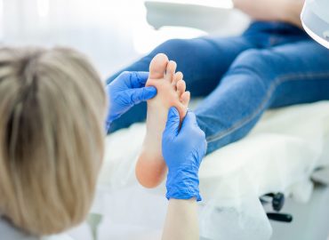 podiatrist treats foot.