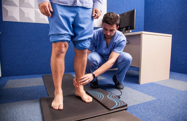 Young man on study of the tread in a podiatry cabinet